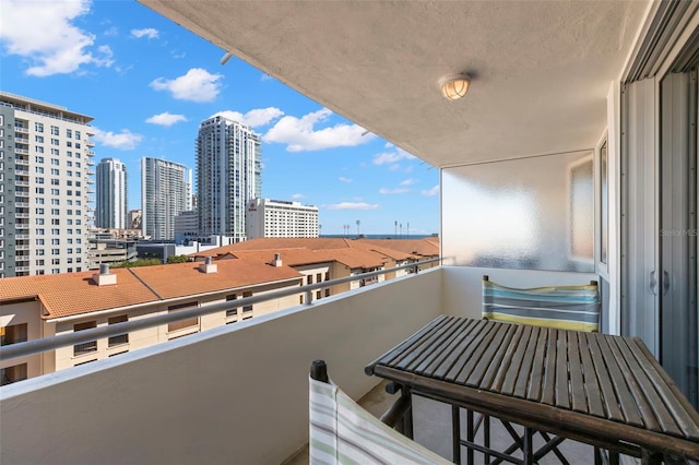 balcony featuring a city view