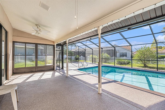 outdoor pool featuring a lanai, a ceiling fan, and a patio