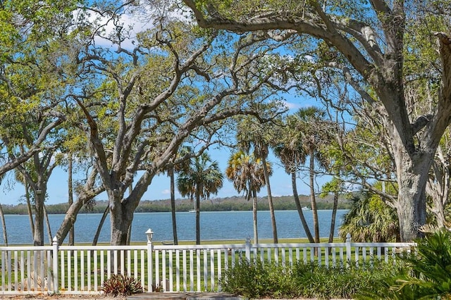 view of water feature with fence