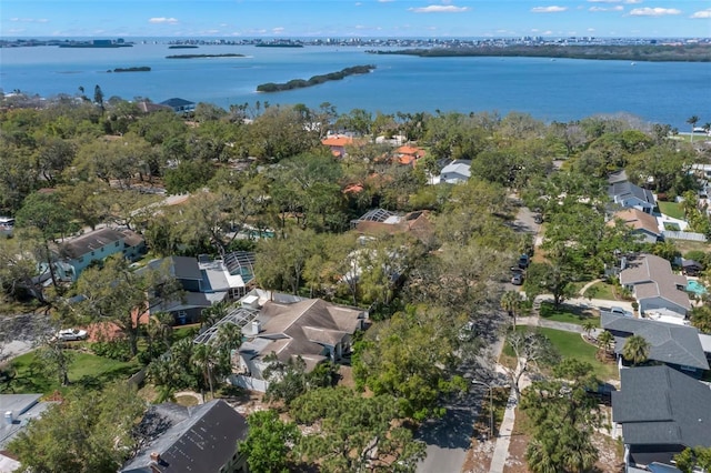 birds eye view of property featuring a water view and a residential view