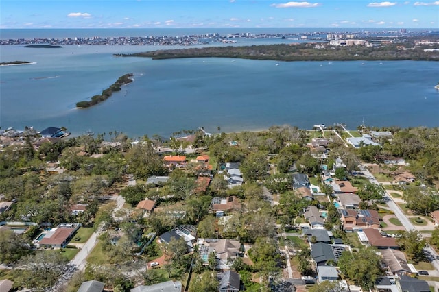 birds eye view of property with a residential view and a water view