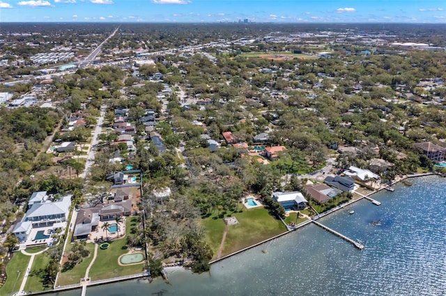 birds eye view of property featuring a residential view and a water view