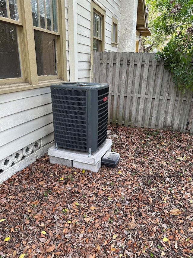 exterior details with cooling unit and fence