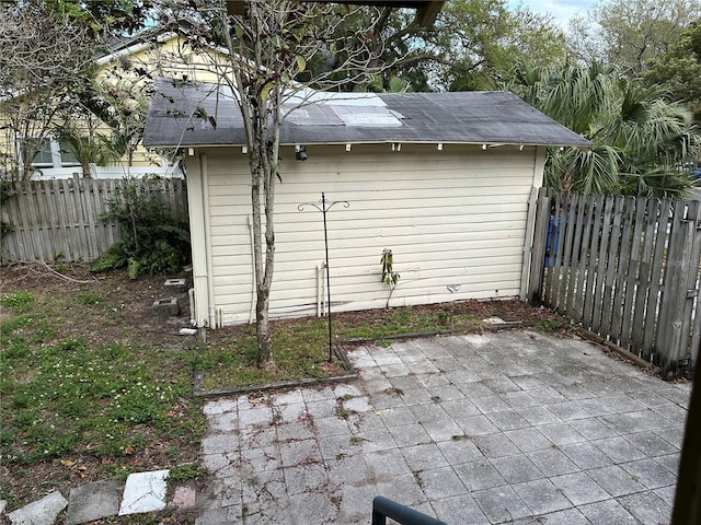 view of shed with a fenced backyard