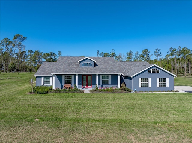 view of front of house with french doors and a front yard