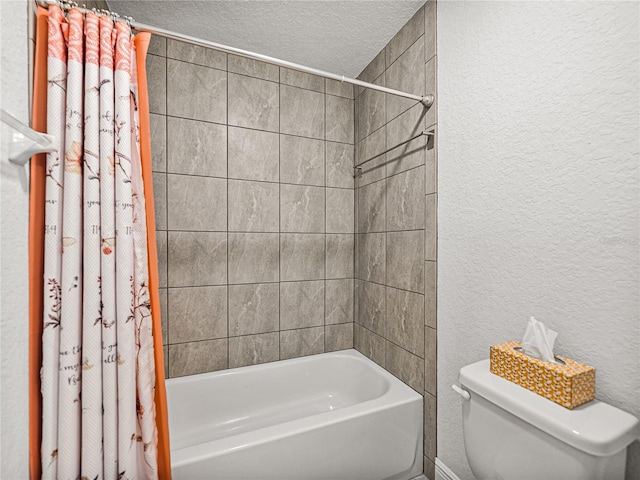 full bathroom featuring shower / bath combination with curtain, toilet, a textured ceiling, and a textured wall