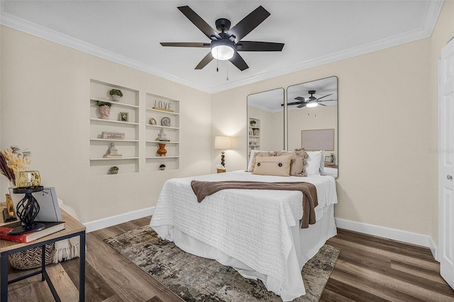 bedroom with ornamental molding, ceiling fan, baseboards, and wood finished floors