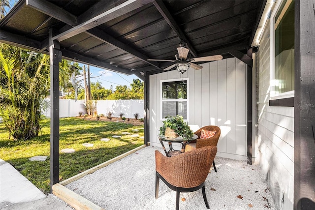 view of patio / terrace featuring a fenced backyard and a ceiling fan