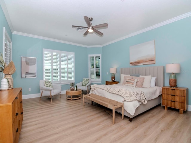 bedroom featuring ceiling fan, baseboards, light wood-style flooring, and ornamental molding