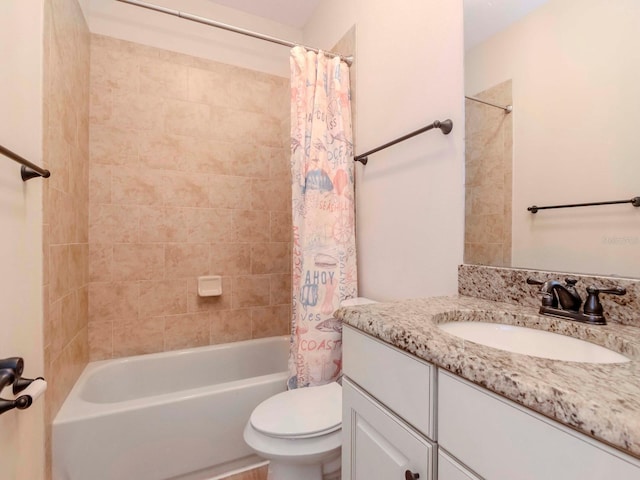 full bathroom with vanity, toilet, and shower / bath combo with shower curtain