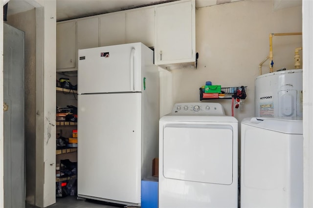 1211 E Camellia Dr, Brandon, FL 33510 - washroom featuring water heater, washing machine and clothes dryer, and cabinet space