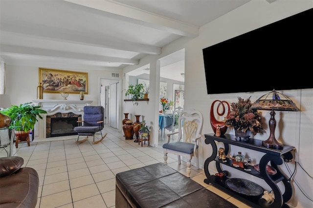 1211 E Camellia Dr, Brandon, FL 33510 - tiled living area featuring beam ceiling and a fireplace