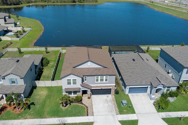 aerial view with a residential view and a water view