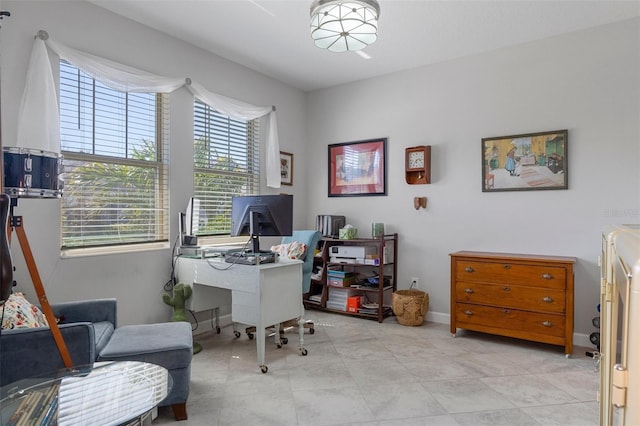 office area featuring baseboards