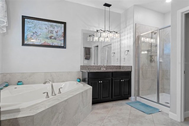 bathroom with vanity, a shower stall, a bath, and tile patterned flooring