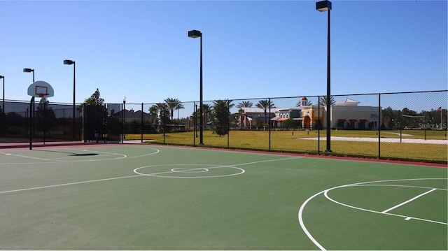 8780 Flourish Dr, Land O Lakes, FL 34637 - view of basketball court featuring community basketball court and fence