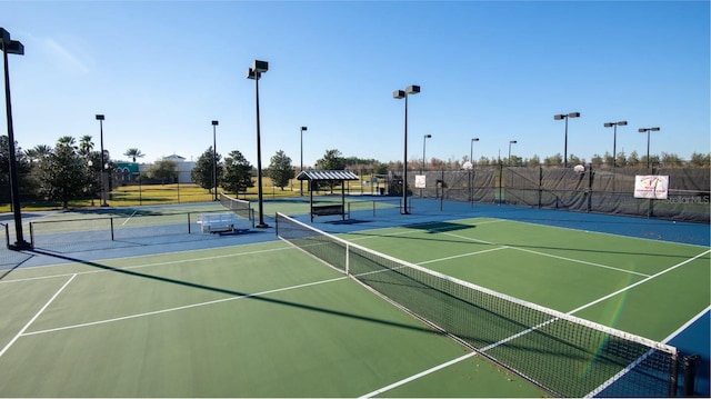 8780 Flourish Dr, Land O Lakes, FL 34637 - view of tennis court featuring community basketball court and fence