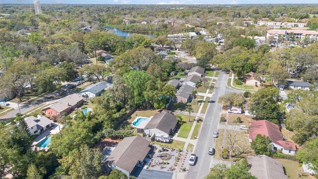 aerial view with a residential view and a water view