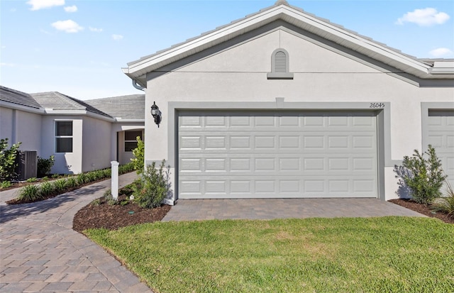 garage featuring driveway