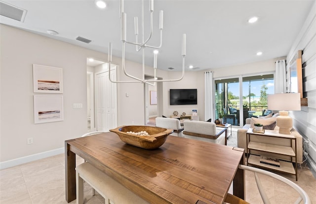 dining room with visible vents, recessed lighting, baseboards, and an inviting chandelier