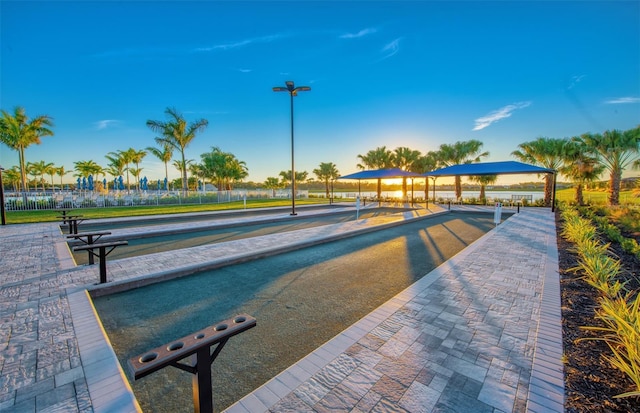 view of pool featuring fence