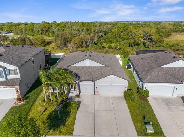 aerial view with a wooded view