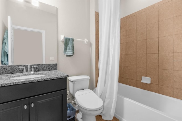 bathroom featuring vanity, toilet, and shower / tub combo with curtain