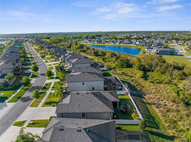 birds eye view of property featuring a residential view and a water view