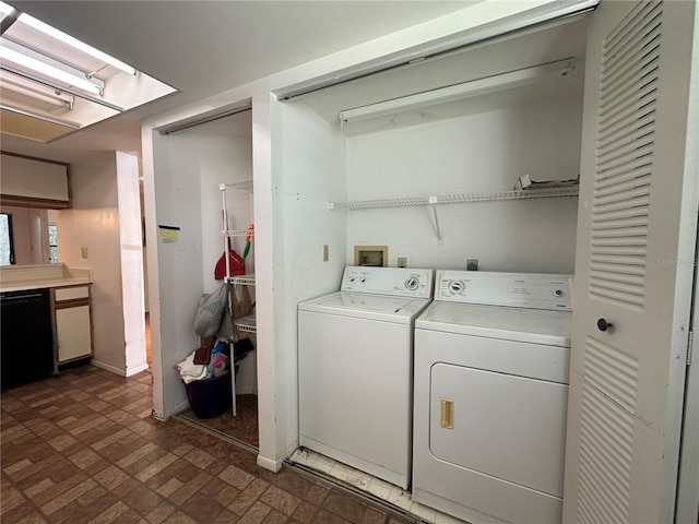 6125 113th St Unit 505, Seminole, FL 33772 - washroom with washing machine and clothes dryer and brick patterned flooring