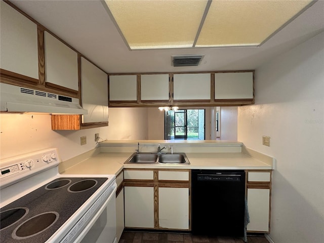 6125 113th St Unit 505, Seminole, FL 33772 - kitchen with white range with electric cooktop, dishwasher, under cabinet range hood, light countertops, and white cabinets