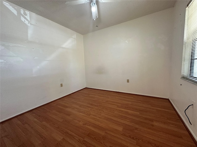 6125 113th St Unit 505, Seminole, FL 33772 - spare room with wood finished floors and ceiling fan