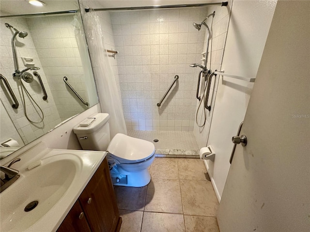 6125 113th St Unit 505, Seminole, FL 33772 - full bath with a shower stall, vanity, and tile patterned floors