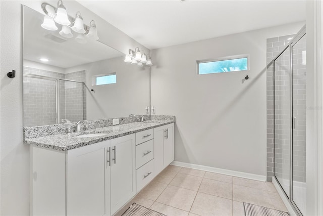 2612 E 26th Ave, Tampa, FL 33605 - full bathroom with tile patterned floors, plenty of natural light, a stall shower, and a sink