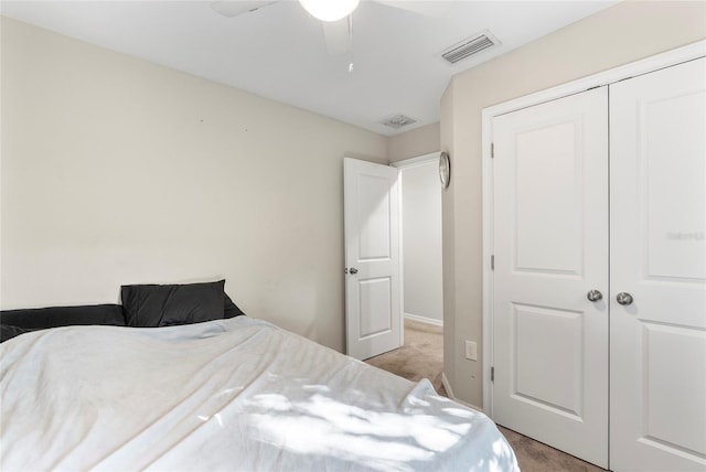 2612 E 26th Ave, Tampa, FL 33605 - bedroom featuring ceiling fan, visible vents, a closet, and light carpet