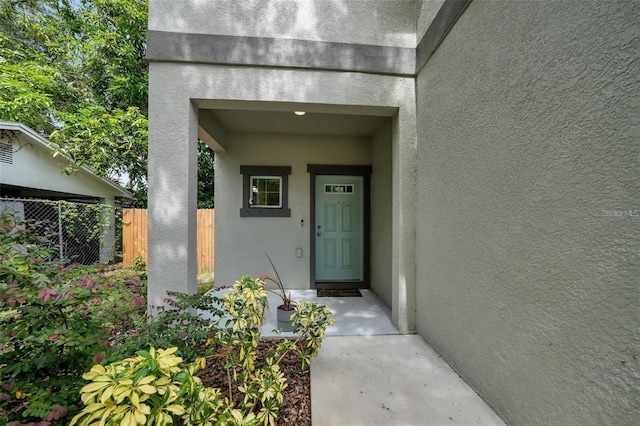 2612 E 26th Ave, Tampa, FL 33605 - entrance to property featuring fence and stucco siding