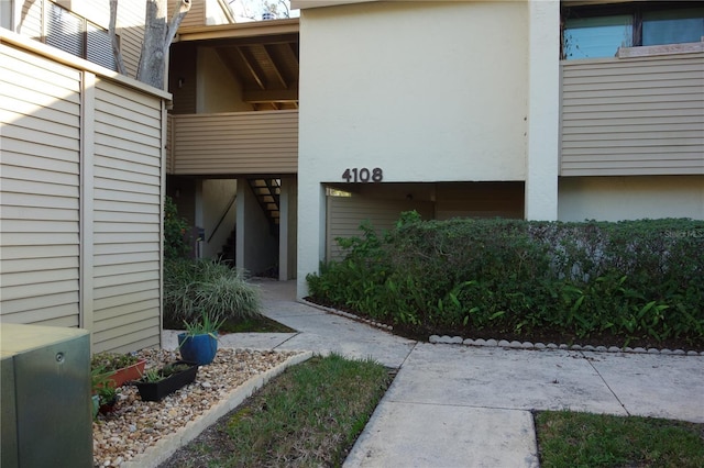 exterior space featuring stucco siding