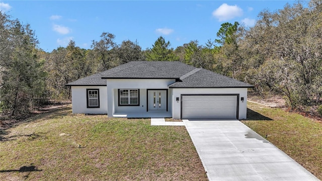 ranch-style house featuring stucco siding, an attached garage, driveway, and a front lawn