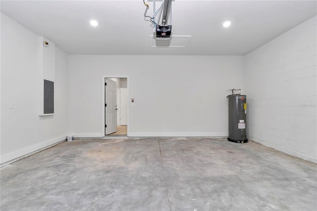 garage featuring baseboards, electric panel, recessed lighting, water heater, and a garage door opener