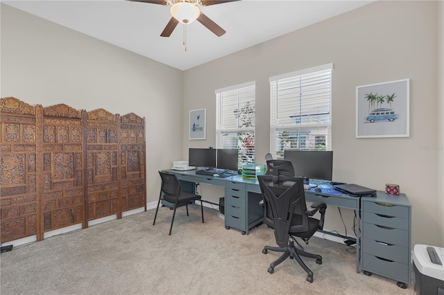 home office with baseboards, carpet, and a ceiling fan