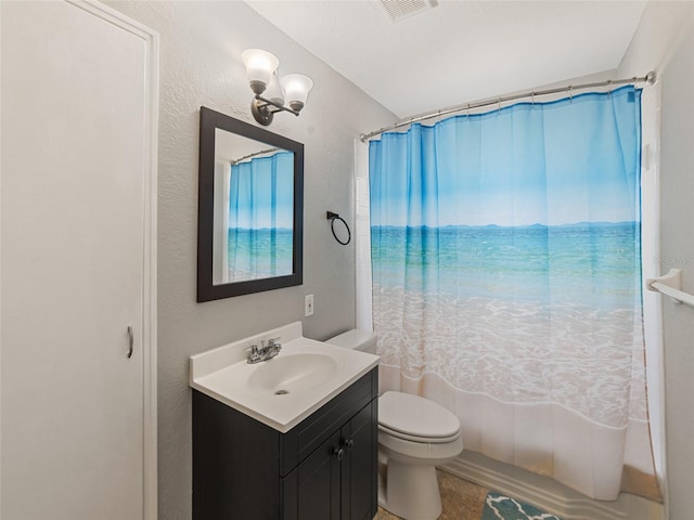 full bath with visible vents, toilet, shower / tub combo with curtain, and vanity