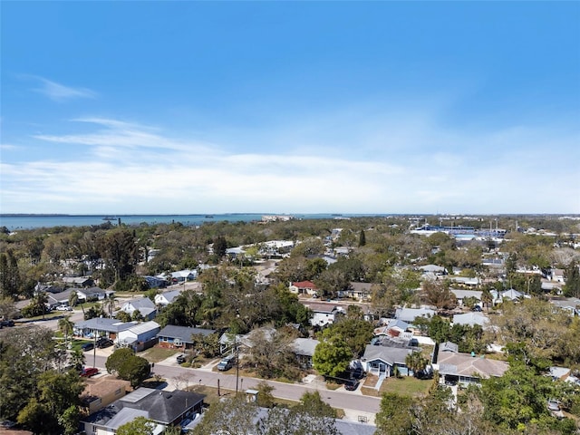 bird's eye view with a residential view and a water view