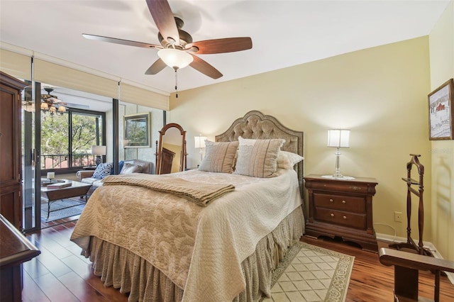 bedroom with access to exterior, dark wood finished floors, baseboards, and a ceiling fan