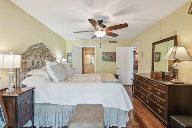 bedroom with a ceiling fan, dark wood-style floors, and visible vents