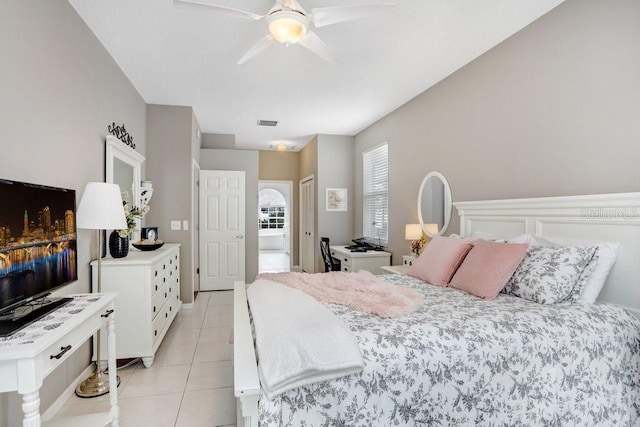 bedroom with light tile patterned floors, visible vents, and ceiling fan