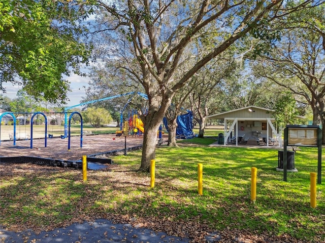 community playground featuring a yard