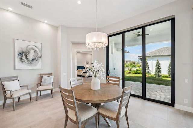 dining area with visible vents, baseboards, light tile patterned floors, recessed lighting, and a notable chandelier