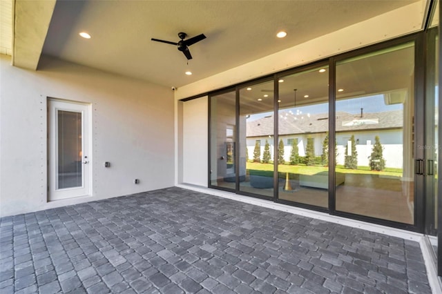 view of patio / terrace with a ceiling fan