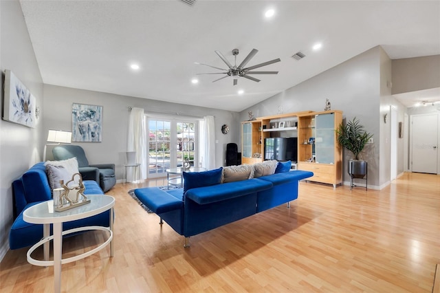 living area with visible vents, a ceiling fan, recessed lighting, light wood finished floors, and lofted ceiling