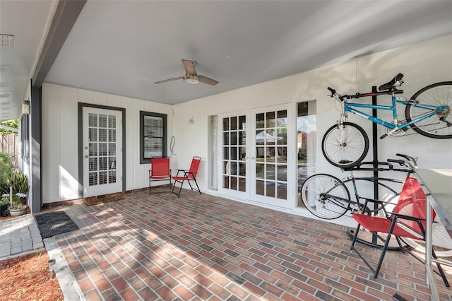 view of patio / terrace with french doors and a ceiling fan