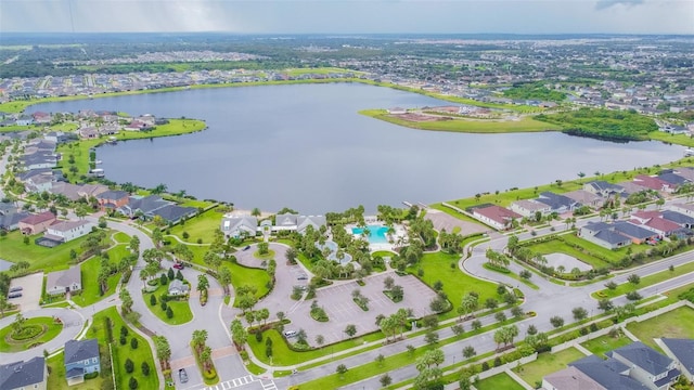 aerial view with a residential view and a water view